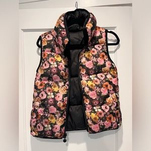 Super cute floral puffer vest.